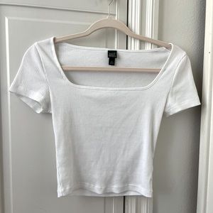 Hi! I’m selling a white ribbed low neck tee! Brand is Wild Fable